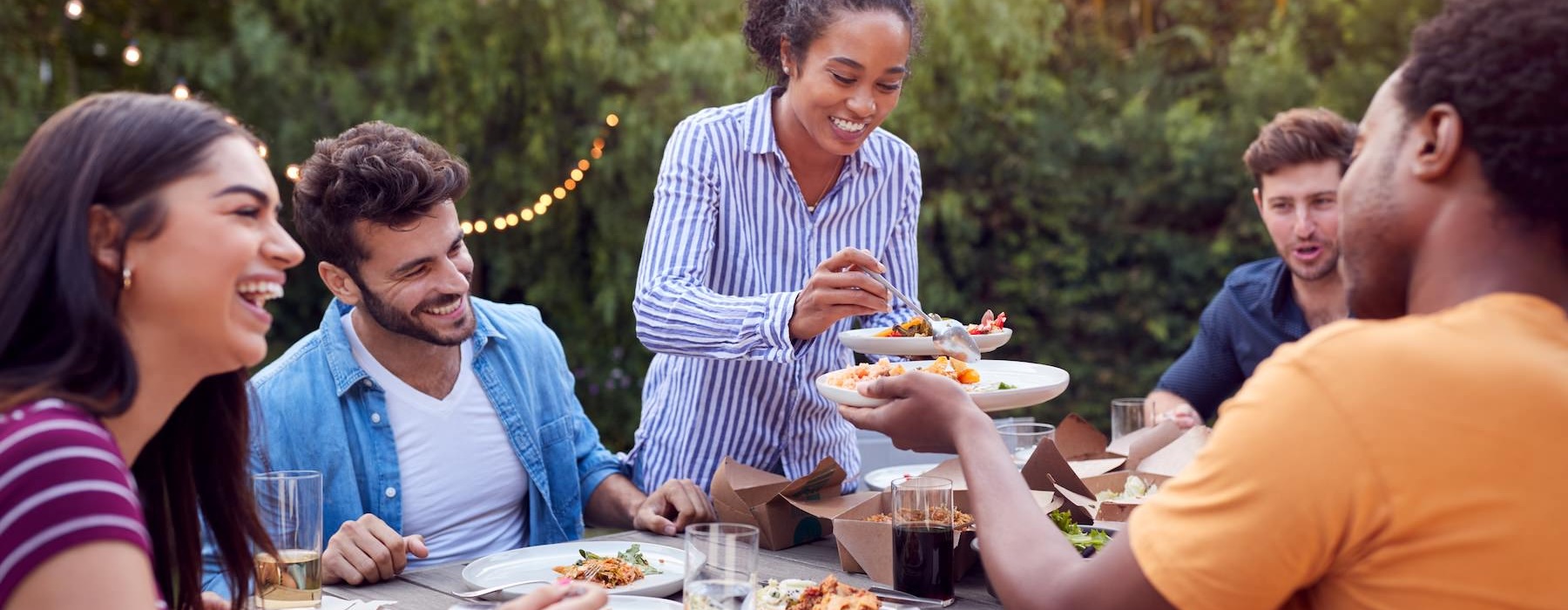people eating food at a table