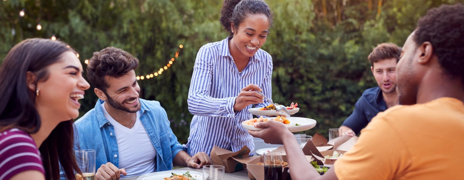 people eating food at a table